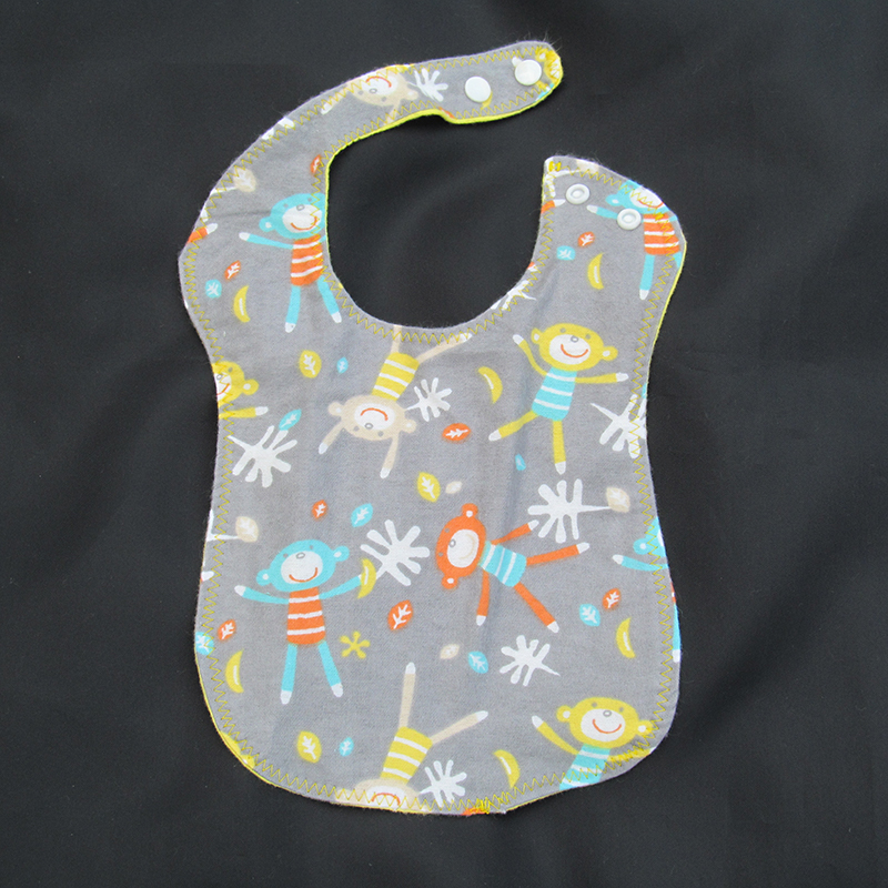 Jumping Monkey Contoured Bib